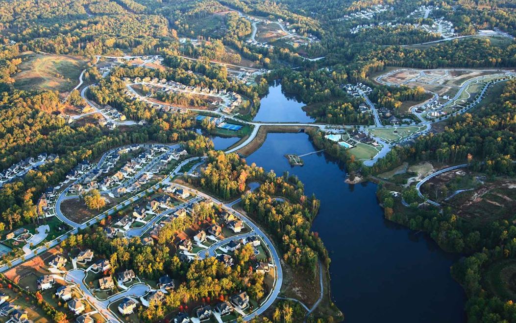 Aerial view of a master planned community and a lake